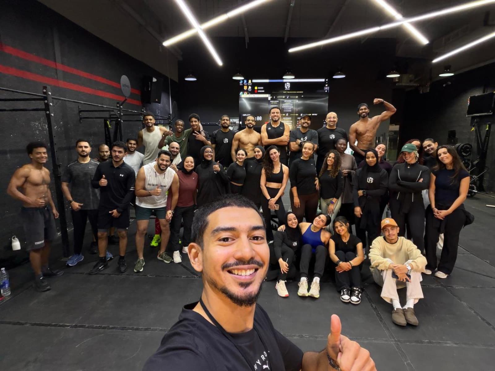 Members crowding into a post-bootcamp selfie